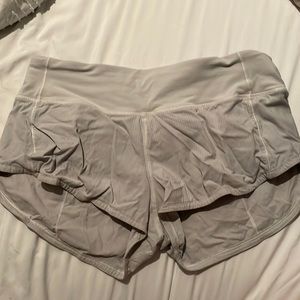 Lululemon size 4 speed ups color white but stained gray.